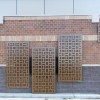 Revamp Panels Cross Hatch pattern metal privacy screen bank architecture remodel commercial